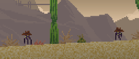 Two Hämis wearing cowboy hats in the desert.